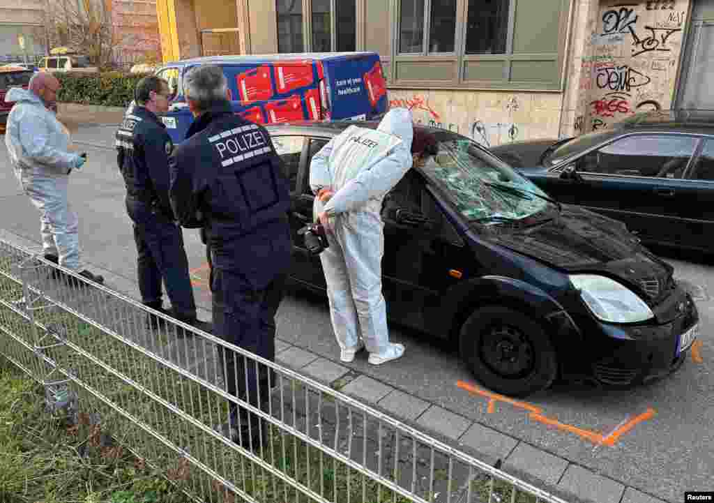 Forensic experts work on a car which drove into a crowd, in Mannheim.&nbsp;A car drove into a crowd in the western German city, killing at least two people and seriously injuring several others, overshadowing carnival celebrations in the region where police had been on alert for attacks.&nbsp;