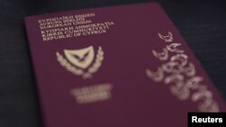 A photo illustration of a Cypriot passport, October 12, 2019.
