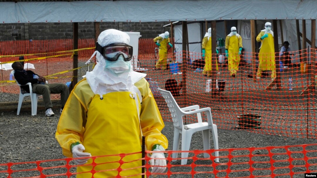Medicins Sans Frontieres (MSF) health workers prepare at ELWA's isolation camp during the visit of Senior United Nations (U.N.) System Coordinator for Ebola David Nabarro, at the camp in Monrovia Aug. 23, 2014.