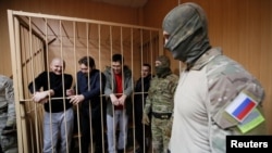 Some of the 24 Ukrainian sailors who were captured by Russia last November appearing in Lefortovo court, Moscow, Russia on January 15, 2019.