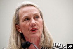 FILE - Alice Wells, acting assistant secretary to South Asia, testifies during a House Foreign Affairs Committee hearing on Capitol Hill in Washington, Sept. 19, 2019.