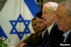 FILE —Former Israeli Defense Minister Benny Gantz meets with U.S. Secretary of State Antony Blinken in Tel Aviv, Israel, Thursday, February 8, 2024.