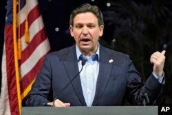 FILE - Florida Gov. Ron DeSantis during a visit to the Florida State Fair, February 2024, in Tampa, Fla.