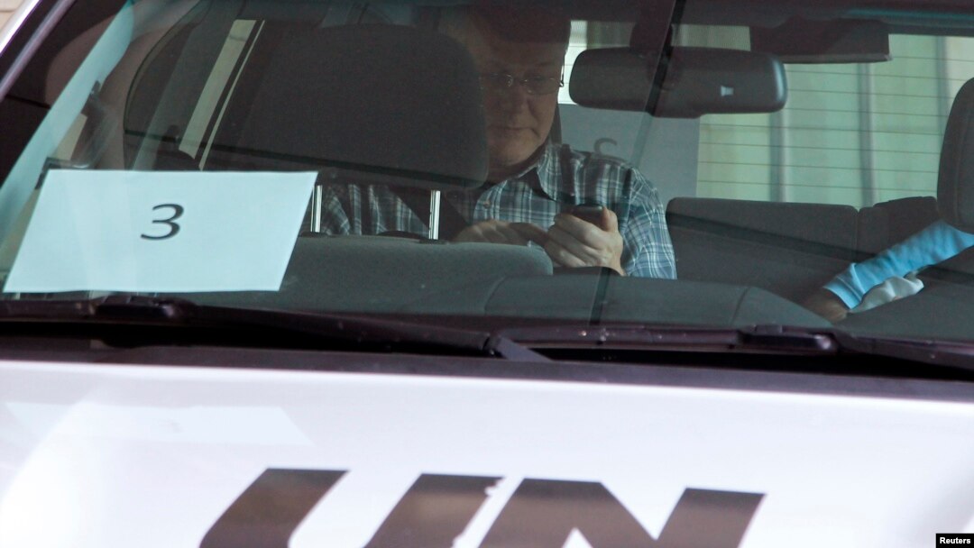 Ake Sellstrom, head of a United Nations (U.N.) chemical weapons investigation team, sits in a U.N. vehicle as he leaves the hotel where the team is staying, in Damascus Sep. 26, 2013. U.N.