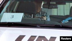 Ake Sellstrom, head of a United Nations (U.N.) chemical weapons investigation team, sits in a U.N. vehicle as he leaves the hotel where the team is staying, in Damascus Sep. 26, 2013. U.N.