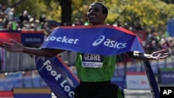 Gebre Gebremariam of Ethiopia celebrates after winning the professional men's division at the New York City marathon in New York, Sunday, Nov. 7, 2010.