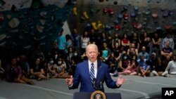President Joe Biden speaks at Sportrock Climbing Centers, May 28, 2021, in Alexandria, Va. 