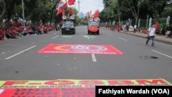 Unjuk rasa buruh pada peringatan Hari Buruh Internasional 1 Mei di Jakarta, Indonesia.