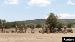 FILE - Soldiers are seen during a training session under the British Army Training Unit Kenya (BATUK), at a camp in Laikipia, Kenya, Sept. 30, 2018. 