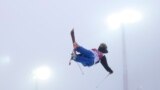 Switzerland's Joel Gisler jumps during a freestyle skiing training session in the halfpipe at the Rosa Khutor Extreme Park, Feb. 17, 2014.