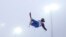 Switzerland's Joel Gisler jumps during a freestyle skiing training session in the halfpipe at the Rosa Khutor Extreme Park, Feb. 17, 2014.