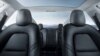 FILE - The interior of the Tesla Model 3 sedan is seen in this undated handout image as the car company handed over its first 30 Model 3 vehicles to employee buyers at the company’s Fremont facility in California, July 28, 2017.