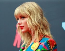 FILE - Taylor Swift arrives at the 2019 MTV Video Music Awards at the Prudential Center, Newark, N.J., Aug. 26, 2019.