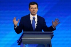 FILE - Democratic presidential candidate Pete Buttigieg speaks during a Democratic presidential primary debate at Saint Anselm College in Manchester, New Hampshire, Feb. 7, 2020.