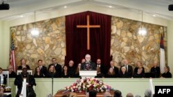 FILE - Jack Carter, son of former US President Jimmy Carter, speaks during a funeral service for former US First Lady Rosalynn Carter, at Maranatha Baptist Church in Plains, Georgia, on November 29, 2023.