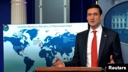 FILE - Tom Bossert, homeland security adviser to President Donald Trump, holds a press briefing to publicly blame North Korea for unleashing the so-called WannaCry cyberattack, at the White House in Washington, Dec. 19, 2017.