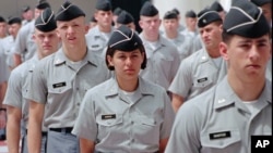 FILE - Citadel cadets march in formation at the military college in Charleston, South Carolina.