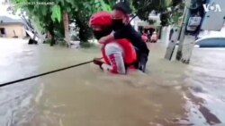 Thai Rescue Team Saves Flood Victims From Deadly Currents