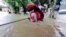 Thai Rescue Team Saves Flood Victims From Deadly Currents