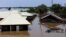 FILE - Houses partially submerged in flood waters are pictured in Lokoja city, Kogi State, Nigeria Sept. 17, 2018. 