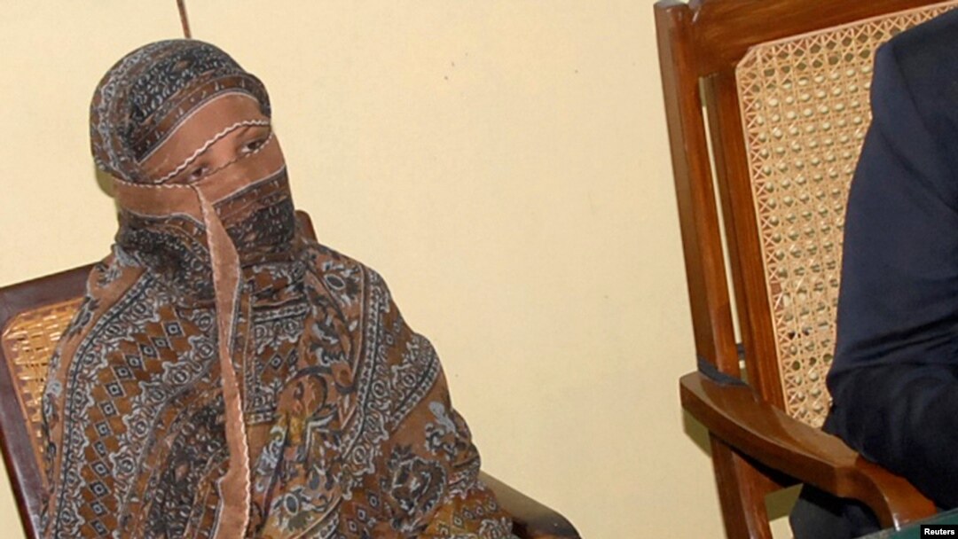FILE - Pakistani Christian woman Asia Bibi is seen after a meeting with the governor of the Punjab Province at a jail in Sheikhupura, Pakistan.