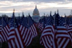 Thousands of U.S. flags are seen at the National Mall near the Capitol, ahead of President-elect Joe Biden's inauguration, in Washington, Jan. 18, 2021.