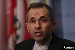 FILE - Iranian Ambassador to the United Nations Majid Takht-Ravanchi speaks to the media outside Security Council chambers at the U.N. headquarters in New York, June 24, 2019.