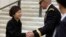 South Korean President Park Geun-hye (L) prepares to leave after presenting a wreath at the Tomb of the Unknown Soldier at Arlington National Cemetery near Washington, May 6, 2013. 