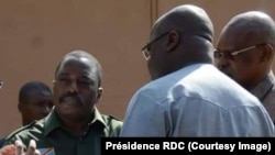 Joseph Kabila mpe président Félix Tshisekedi na masolo na Cité ya Union africaine, Kinshasa, le 17 février 2019. (Présidence RDC)