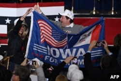 Pendukung mantan Presiden AS dan calon presiden dari Partai Republik Donald Trump di Des Moines, Iowa, pada 15 Januari 2024. (Foto: AFP)