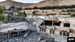 This aerial view shows the aftermath of an overnight strike attributed to Israel on the Barzeh scientific research center affiliated with the Syrian defense ministry in northern Damascus on Dec. 10, 2024.