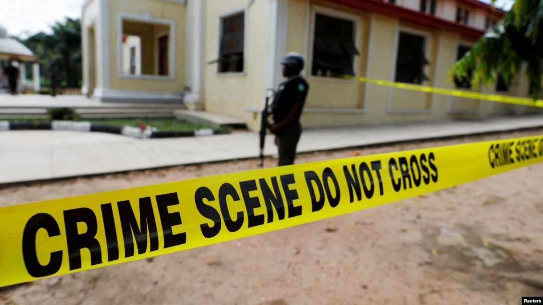 FILE - Police crime scene tape is seen in Owo, Ondo, Nigeria, June 6, 2022.