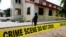 FILE PHOTO: A police crime scene tape is seen in front of St. Francis Catholic Church where gunmen attacked worshippers during a Sunday mass service in Owo, Ondo, Nigeria, June 6, 2022