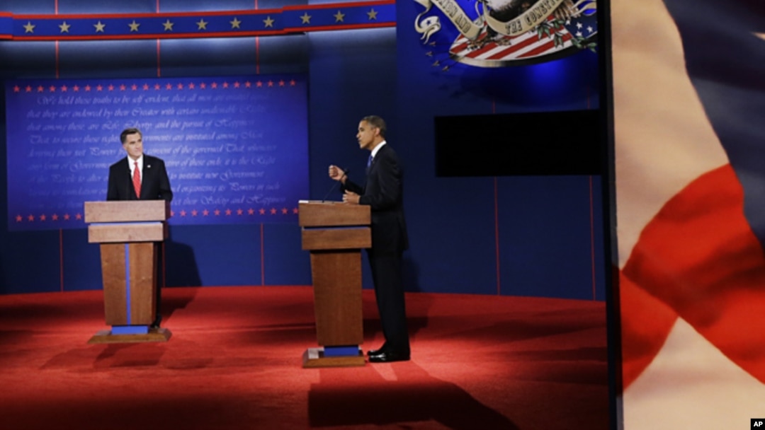 Republican presidential nominee Mitt Romney (l) debates President Barack Obama at the University of Denver, Oct. 3, 2012, in Denver
