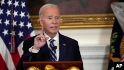 President Joe Biden speaks at a reception for new Democratic members of Congress in the State Dining Room of the White House, Jan. 5, 2025, in Washington.