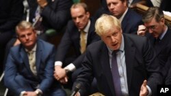 Britain's Prime Minister Boris Johnson speaks in the House of Commons following the debate for the EU Withdrawal Agreement Bill, in London, Oct. 22, 2019.