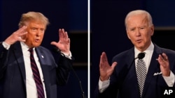 FILE - This combination of Sept. 29, 2020, file photos show President Donald Trump, left, and former Vice President Joe Biden during the first presidential debate at Case Western University and Cleveland Clinic, in Cleveland, Ohio. 