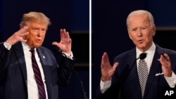 FILE - This combination of Sept. 29, 2020, file photos show President Donald Trump, left, and former Vice President Joe Biden during the first presidential debate at Case Western University and Cleveland Clinic, in Cleveland, Ohio. 