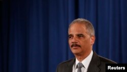 El secretario de Justicia Eric Holder anunció el arresto de los presuntos espías rusos.