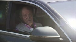 FILE - Former Spain's King Juan Carlos sits in a car as he leaves Quiron Hospital one week after a heart surgery in Madrid, Spain, August 31, 2019 in this still image taken from a video obtained by Reuters.