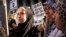 FILE - Muslim women protest against alleged heavy-handedness on the part of the New York Police Department (NYPD).