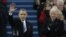 President Barack Obama waves after his speech while Vice President Joe Biden applauds at the ceremonial swearing-in at the U.S. Capitol, Jan. 21, 2013. 