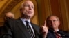 US Senator John McCain, flanked by fellow senator, Robert Menendez, speaks to the media after the Senate passed the immigration reform bill, on Capitol Hill in Washington June 27, 2013.