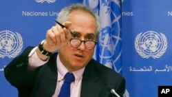 FILE - United Nations spokesman Stephane Dujarric fields questions, at U.N. headquarters, June 20, 2017.