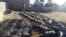 Weapons and explosives confiscated by Iraqi security forces from Islamic State militants are on display Dec. 22, 2015, at an Iraqi army base as security forces advance their position in northern Ramadi, west of Baghdad, Iraq. 