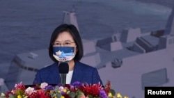 Taiwan President Tsai Ing-wen makes a speech at a delivery ceremony for the Navy's Yushan amphibious landing dock in Kaohsiung