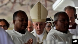 Pope Francis arrives to celebrate Mass at the Monument Mary Queen of Peace, in Port Louis, Mauritius, Sept. 9, 2019. 