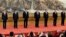 China's new Politburo Standing Committee members (L-R) Han Zheng, Wang Huning, Li Zhanshu, Xi Jinping, Li Keqiang, Wang Yang and Zhao Leji, line up as they meet with the press at the Great Hall of the People in Beijing, China October 25, 2017. 