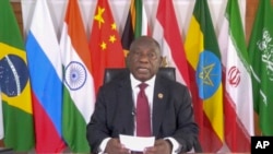 FILE —In this image made from video supplied by South Africa's Presidency, South African President Cyril Ramaphosa addresses BRICS leaders for a virtual meeting of leaders of developing countries, Nov. 21, 2023.