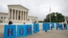 FILE - Deferred Action for Childhood Arrivals (DACA) students gather in front of the Supreme Court in Washington, June 18, 2020.